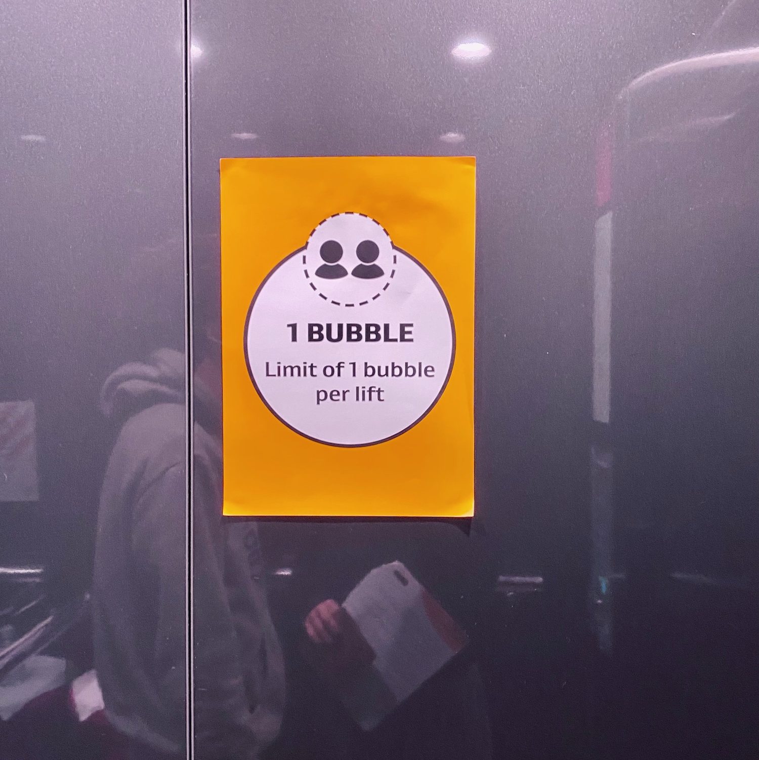 new zealand managed isolation: 1 bubble in the elevator (lift) sign